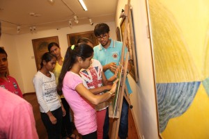 Students exploring the 3d Tactile Reproduction of J. Swaminathan’s artwork Photo Courtesy: DAG Modern 